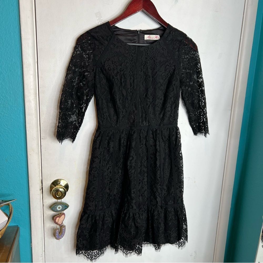 This is an Alannah Hill black lace dress midi Australian